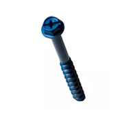 Close-up of a blue metallic Simpson Strong-Tie Titen Turbo 1/4 in. x 3-3/4 in. Hex Head Concrete Screw, highlighting its reverse thread design and cylindrical top, with a threaded bottom against a white background.