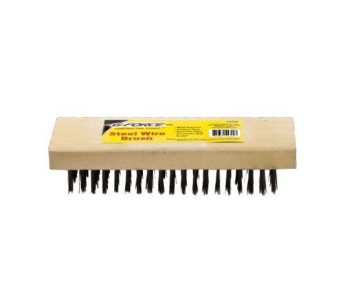 The G-FORCE 44459 6 in. x 19 in. Wood Handle Block Steel Wire Brush by G FORCE features dense, dark high carbon steel bristles on a rectangular wooden handle, ideal for cleaning and refinishing tasks, complete with a yellow label and text on top.