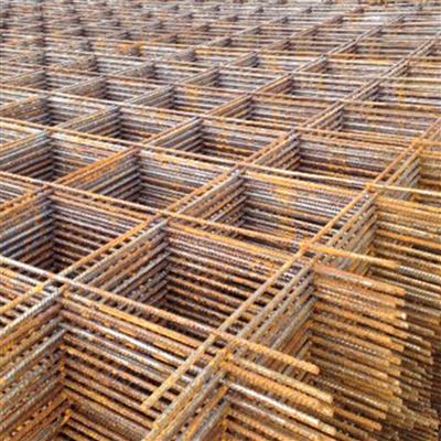 A close-up of Weyerhaeuser 10ga Concrete Mesh (5 ft. x 10 ft., 6 in. x 6 in.) from Go Build, shows a crisscross pattern ideal for foundation reinforcement in concrete structures. The steel meshs geometric design enhances durability and strength.